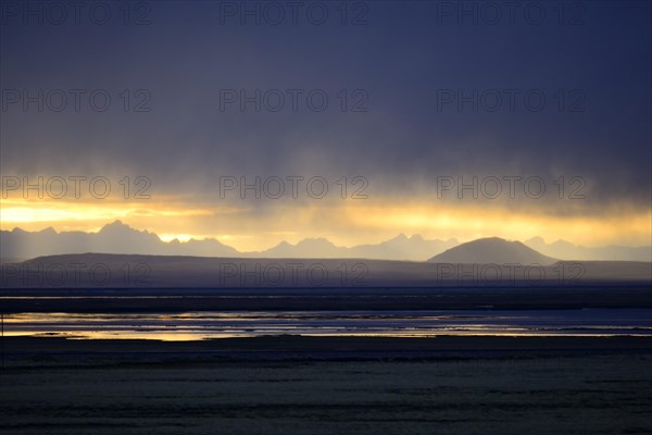 Central Cordillera at sunset and thundershowers