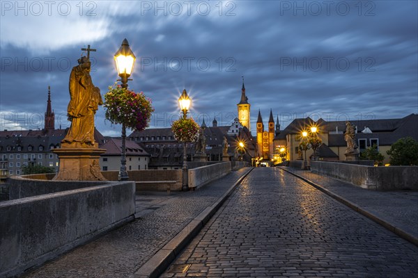 Old bridge over the river Main at dawn
