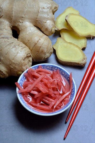 Pickled ginger in small bowls and ginger slices