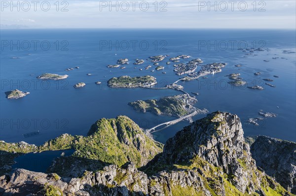 Houses on small rocky islands in the sea