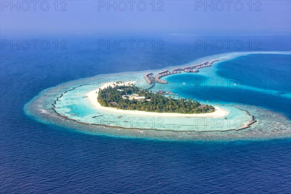 Island holiday paradise sea text free space copyspace Halaveli Resort Ari Atoll aerial photo tourism in the Maldives