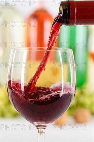 Pour wine pouring from wine bottle wine glass red wine bottle upright