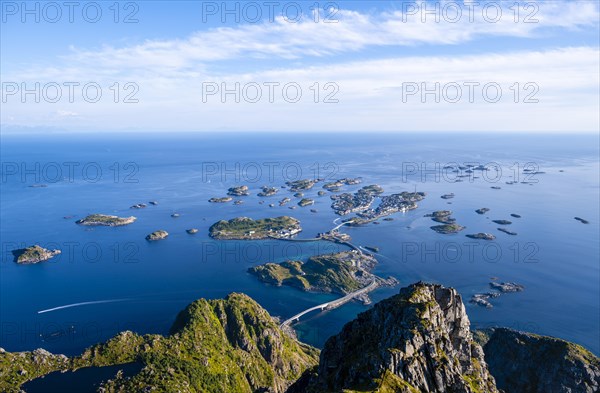 Houses on small rock islands in the sea