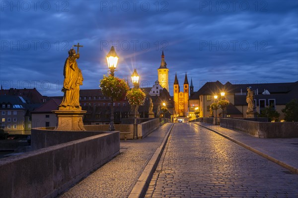 Old bridge over the river Main at dawn