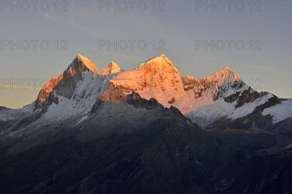 Mountain massif of Nevado Huandoy at sunrise