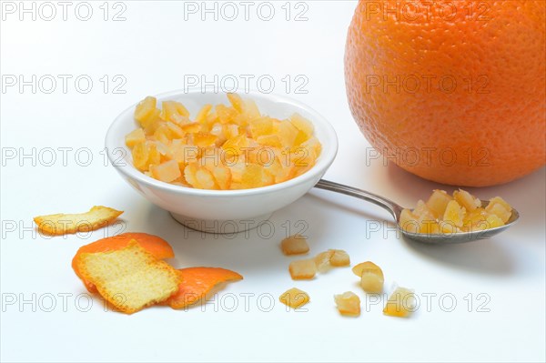 Candied orange peel cubes in small bowls