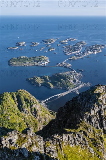 Houses on small rocky islands in the sea