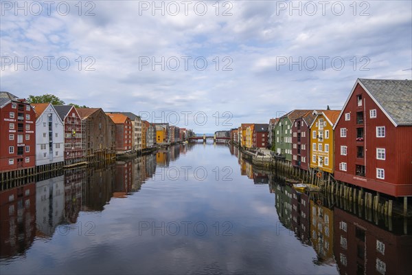 Colourful historic warehouses by the river Nidelva