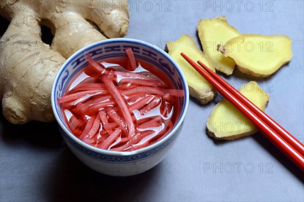 Pickled ginger in small bowls and ginger slices