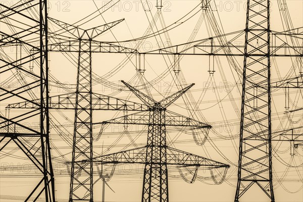 Power pylons at sunset