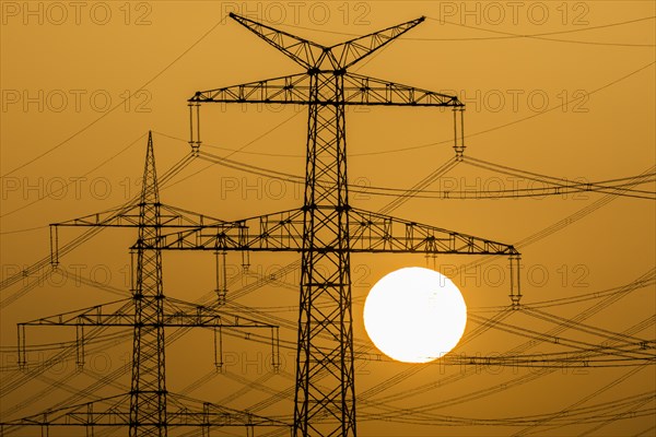 Power pylons at sunset