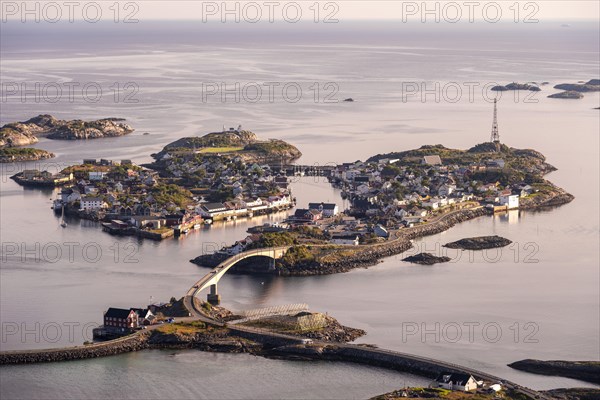 Houses on small rock islands in the sea