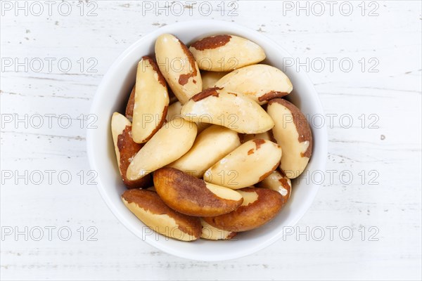 Brazil nuts nuts from above wooden board wood