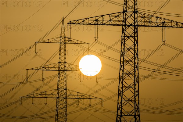 Power pylons at sunset