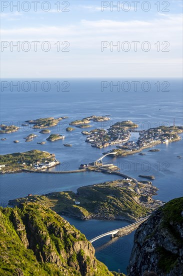 Houses on small rocky islands in the sea