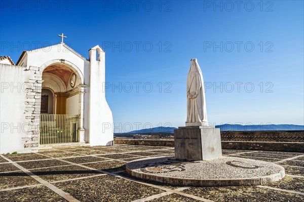 Monument of queen Saint Isabela next to church of Saint Mary