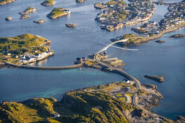 Houses on small rocky islands in the sea