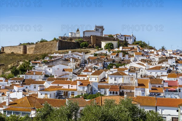 Cityscape of historic town with castle