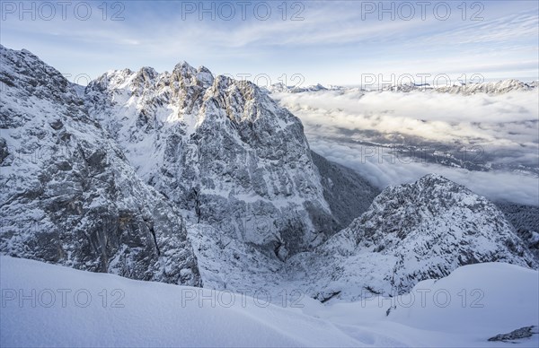 View of snowy Waxenstein and cloudy valley