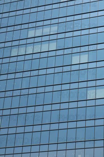 Glas facade of a business building in Ginza district