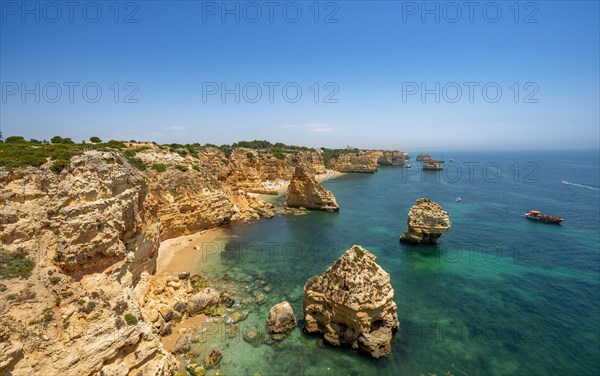 View of cliff of craggy sandstone rocks