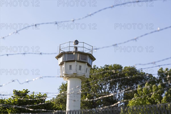 Barbed wire and historical observation tower