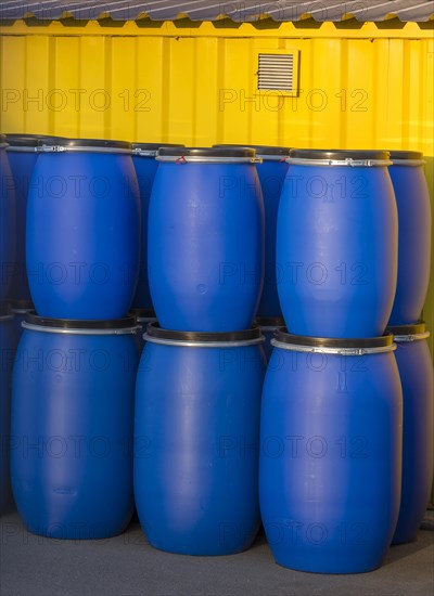 Blue plastic bins for hazardous waste at a recycling centre