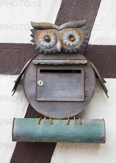 Mailbox and newspaper roll