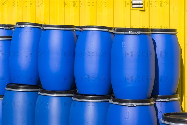 Blue plastic bins for hazardous waste at a recycling centre