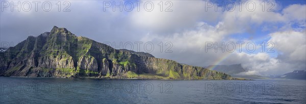 Rainbow at the entrance to the fjord of