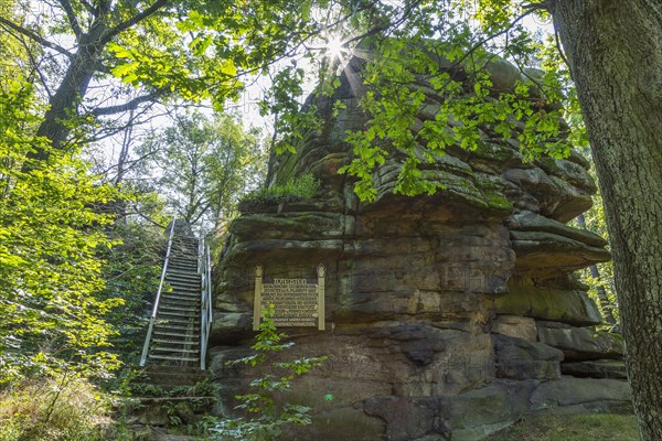 Rock formation Totenstein with information board and stairs to climb