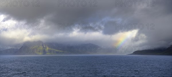 Rainbow at the entrance to the fjord of