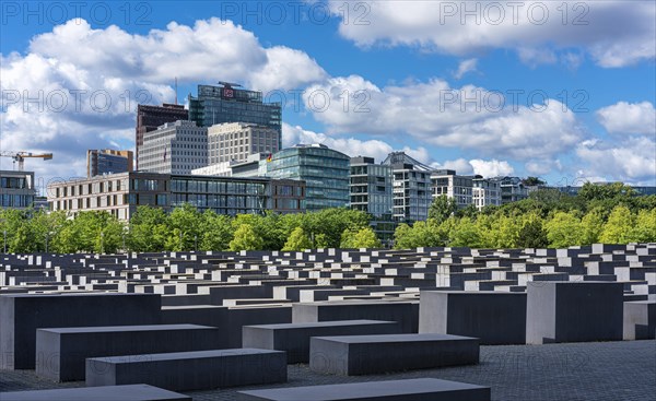 Holocaust Memorial with the skyline of Potsdamer Platz