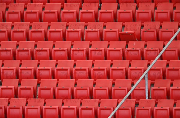 Red rows of seats on the grandstand