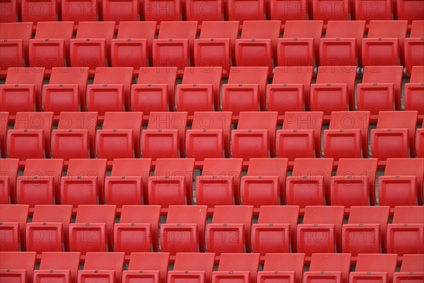 Red rows of seats on the grandstand