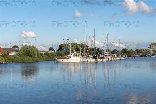 Sailing yachts on the river Harle