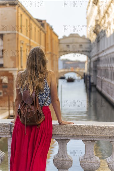 Young woman with red skirt