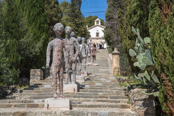 Sculptures on the stairs Carrer del Calvari