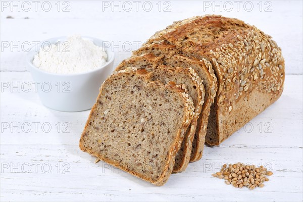 Bread multigrain bread wholemeal bread grain bread sliced slice on wooden plate