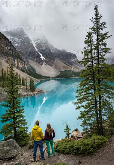 Couple looking over lake