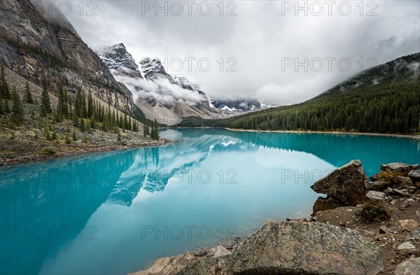 Clouds hanging between mountain peaks