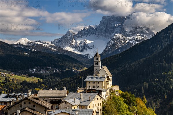 Church of Colle Santa Lucia with peak of Monte Pelmo in the background