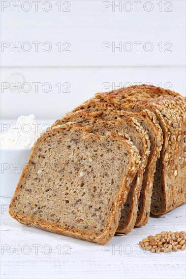 Bread multigrain bread wholemeal bread grain bread sliced slice on wooden board