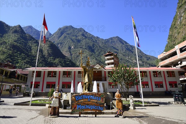 Fountain with statue of the Inca Pachacutec and other figures at the main square of Aguas Calientes