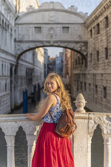 Young woman with red skirt