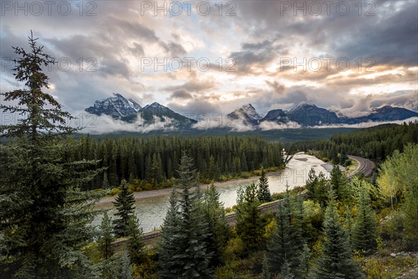 Cloudy Rocky Mountains at sunset