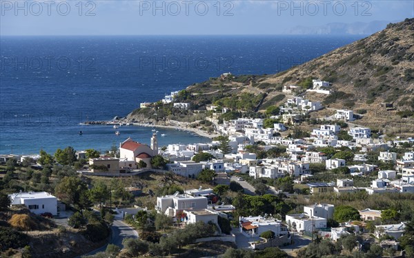 View of the village and the bay of Kini with the church Ekklisia Panagia