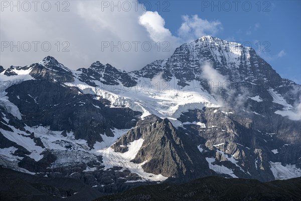 Snow covered mountain top Jungfrau with glacier Jungfraufirn