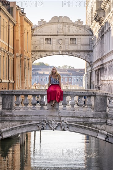 Young woman with red skirt