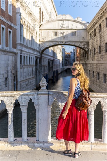 Young woman with red skirt